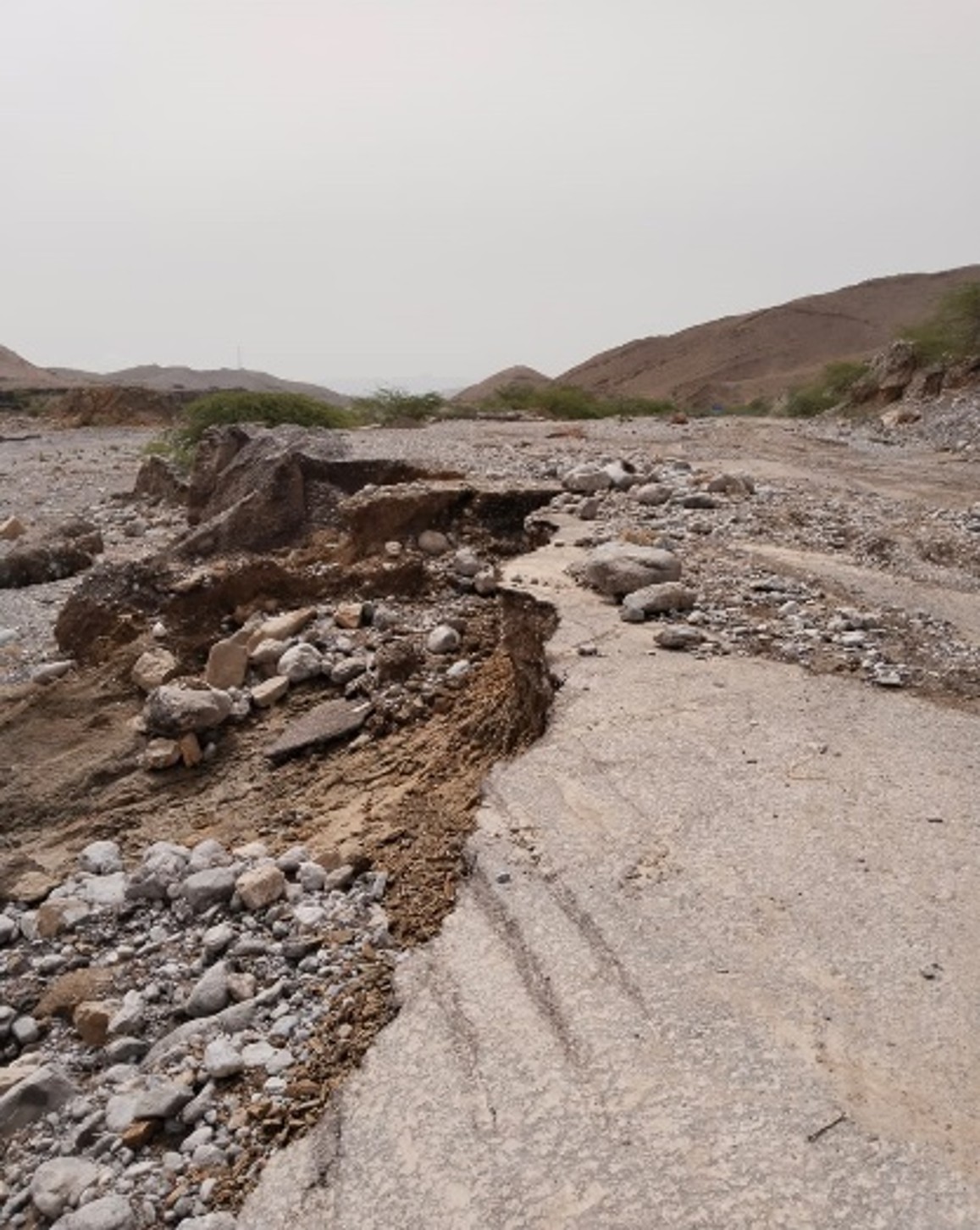 The main road has been destroyed by a riverine flood in Badin.