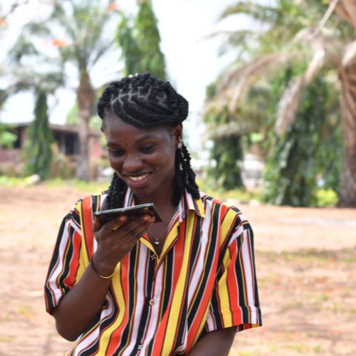 Participant using a smartphone to record a cough sample